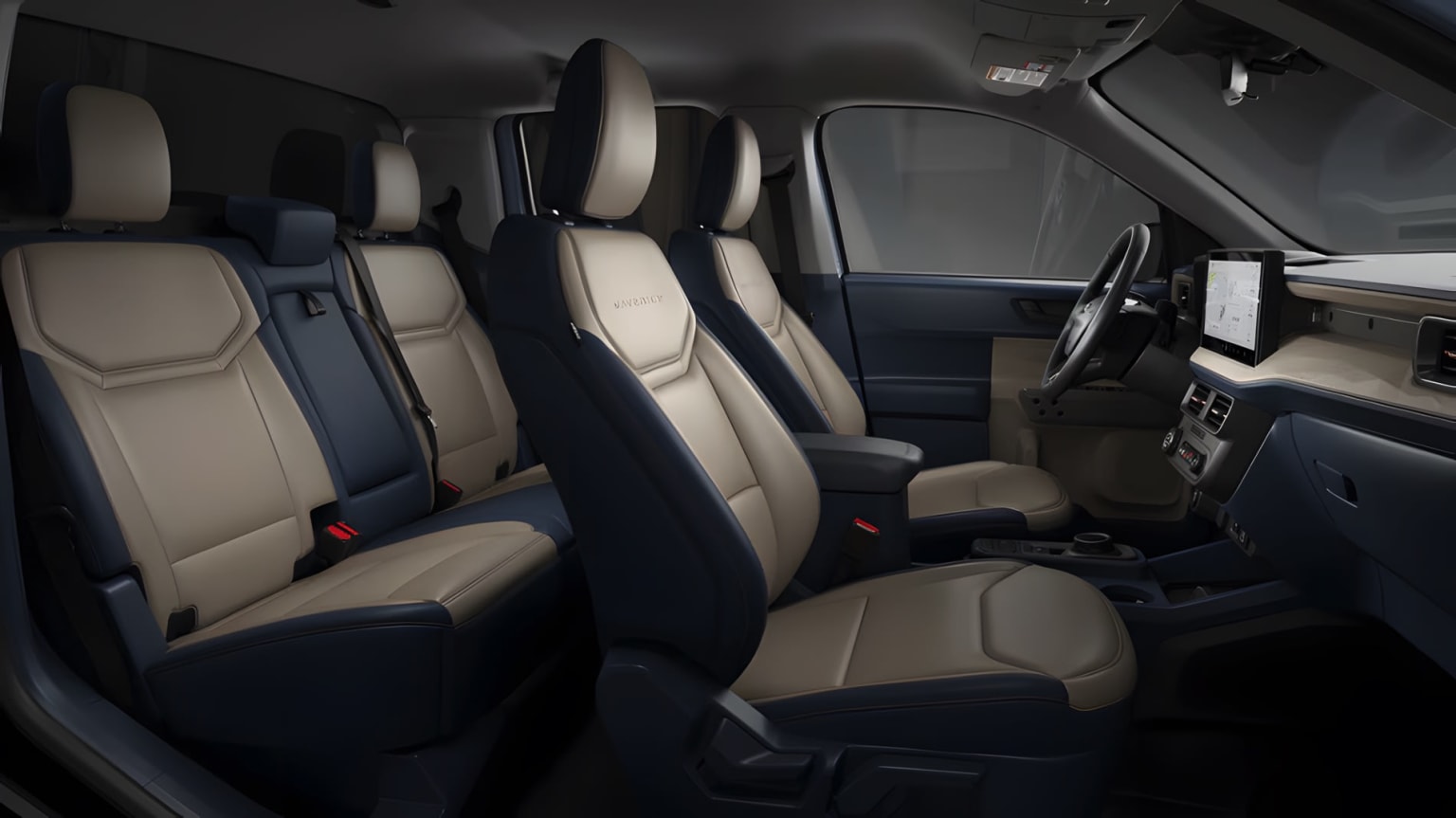Interior of a vehicle with beige and black leather seats arranged in rows, showing a spacious and well-designed cabin.