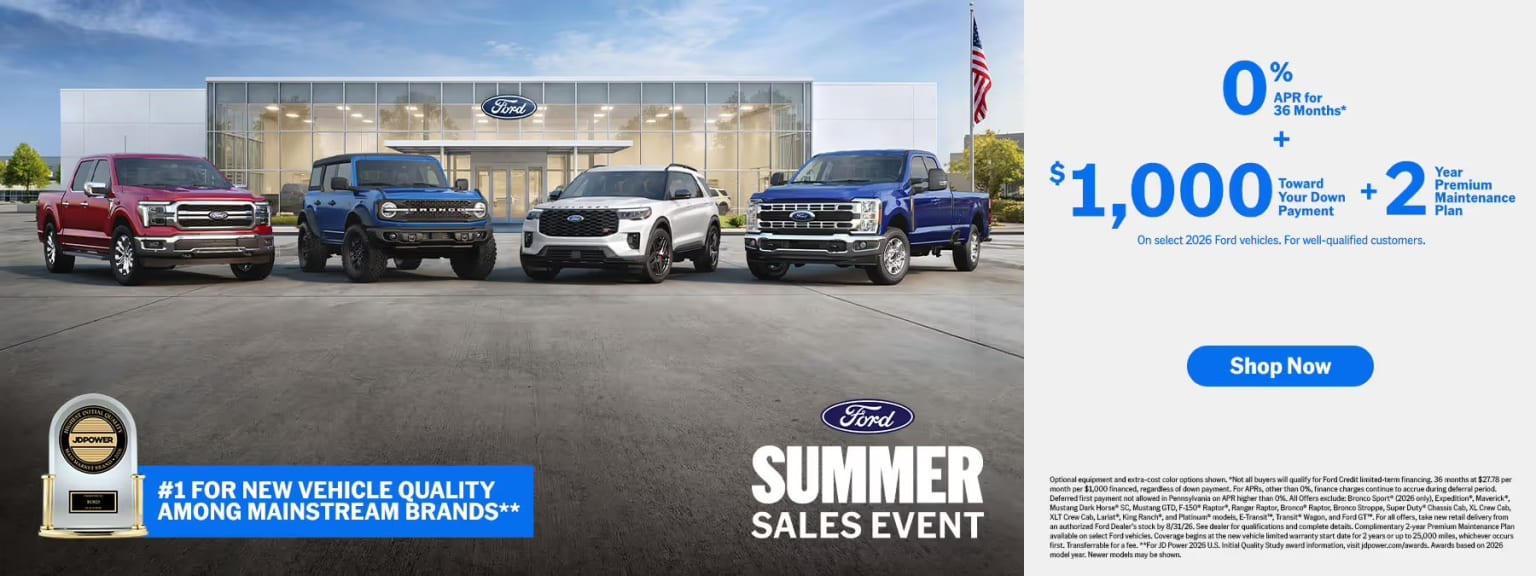 Four vehicles are parked in front of a dealership, with a summer sales event promotion on the right.