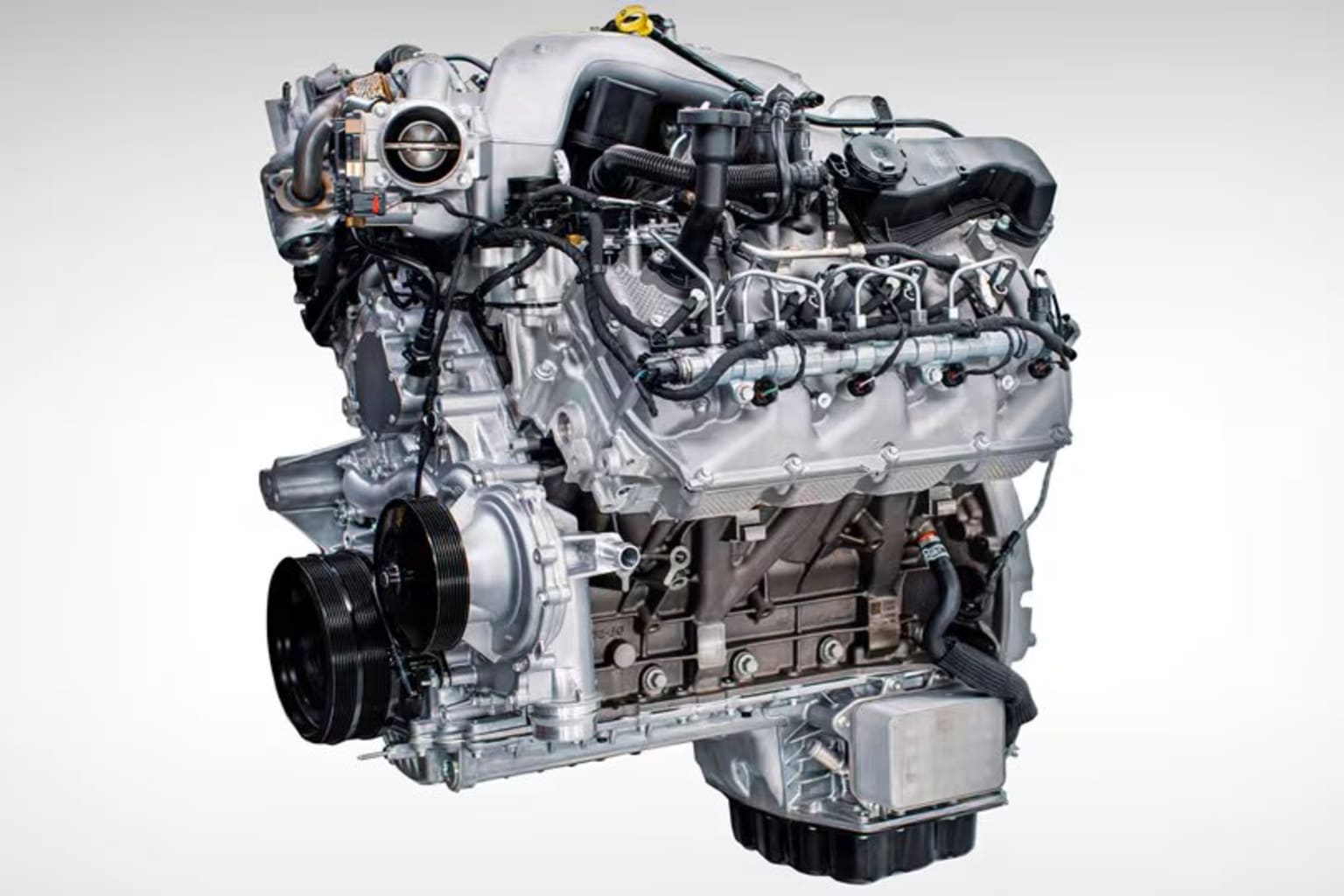 Detailed image of a complex automotive engine with intricate components and mechanical design.