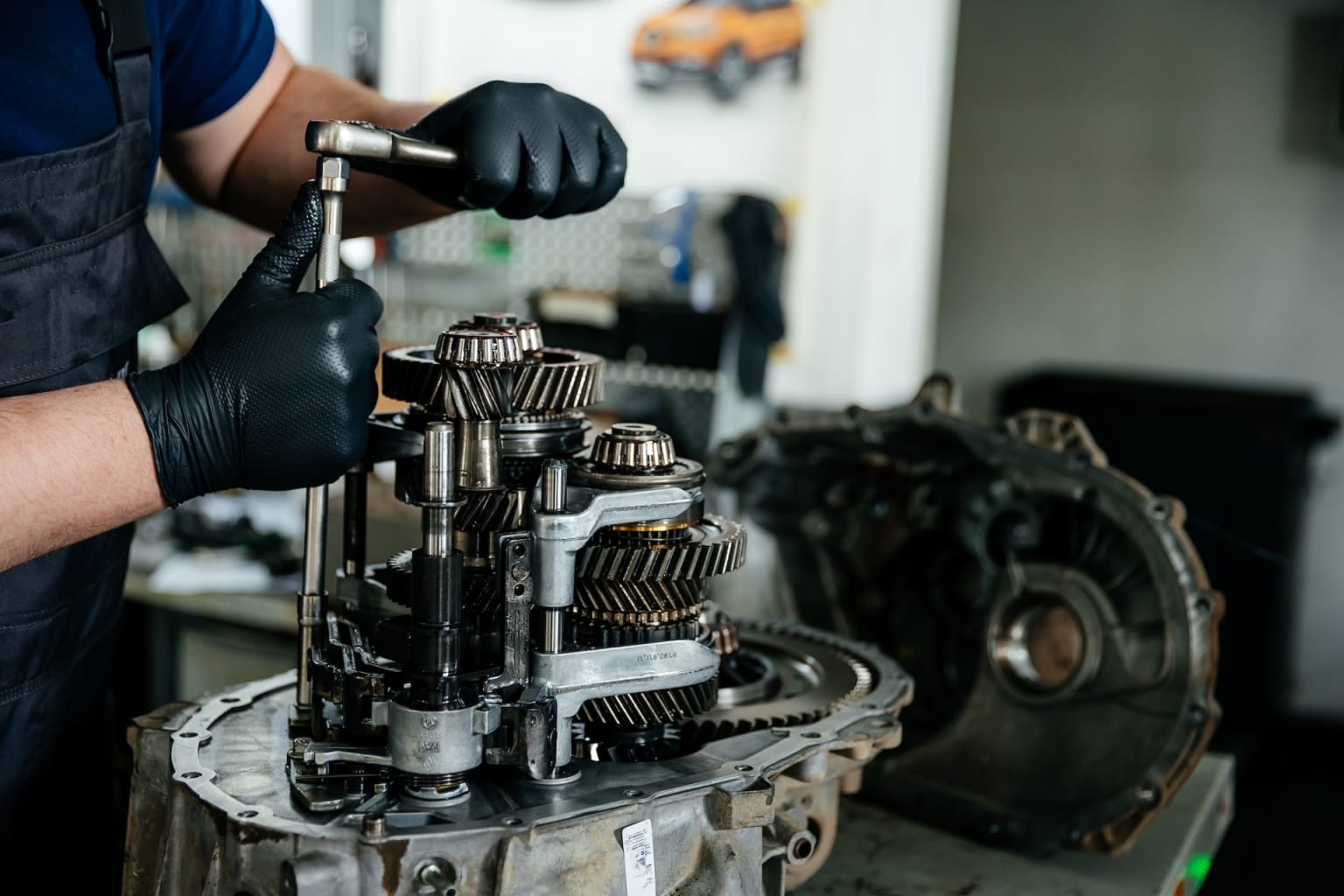Technician servicing a Honda transmission at Apple Honda in Ellicott City, MD