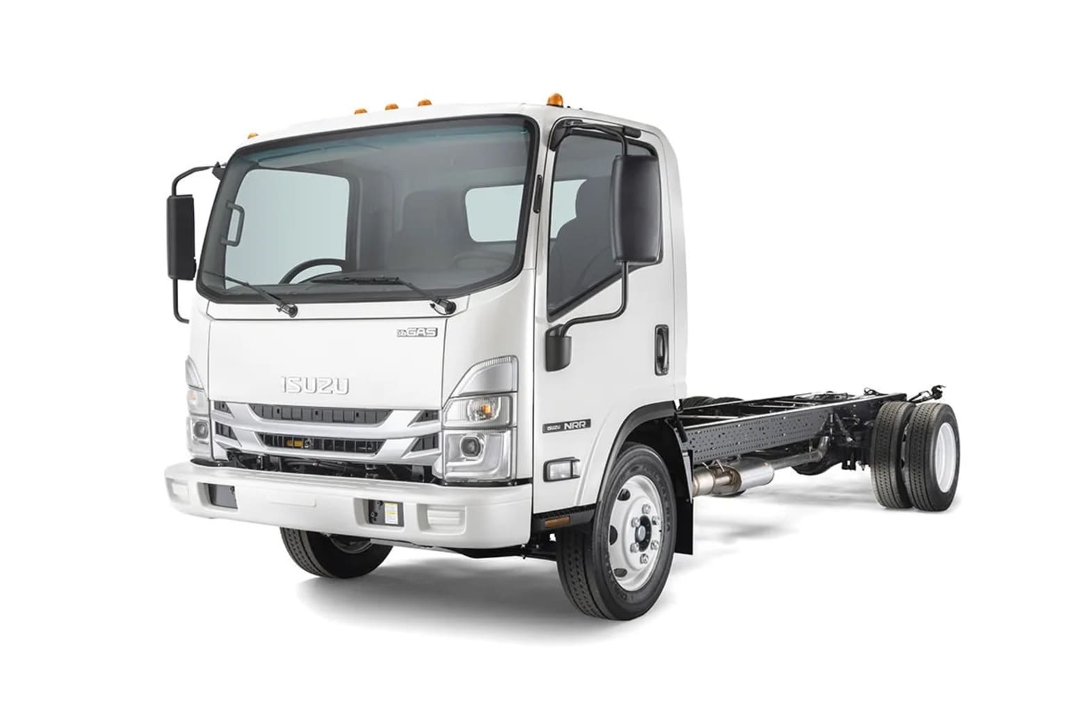 A white commercial truck with a cab-over design and a flatbed trailer chassis stands in the foreground against a plain white background.