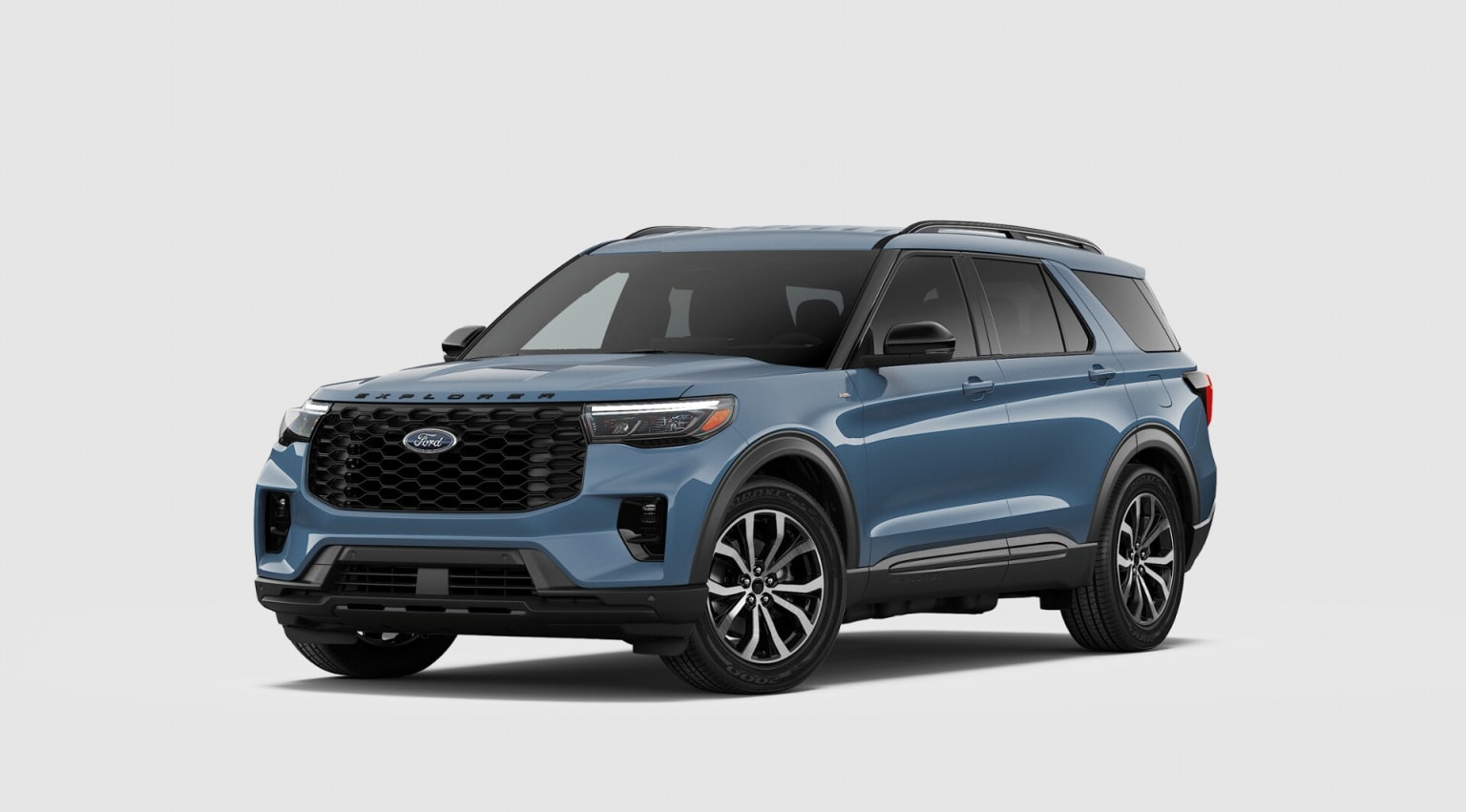 A large, rugged-looking SUV with a bold, angular design and a distinctive grille stands prominently against a plain white background.