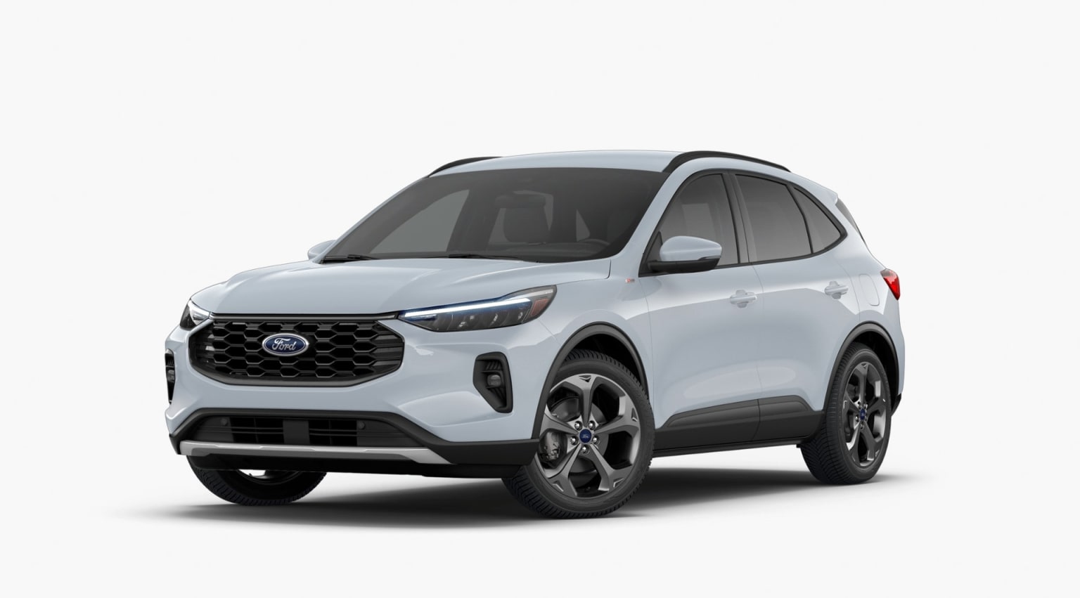 A white SUV with a sleek, modern design stands prominently in the frame, its bold grille and angular headlights catching the eye.