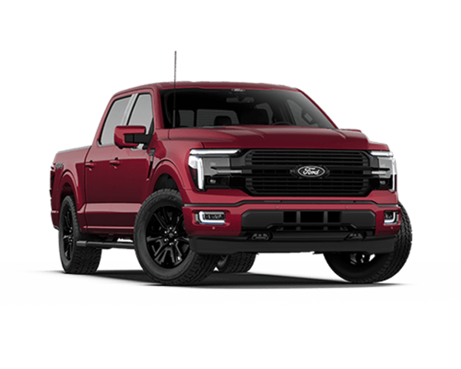 A red pickup truck with a bold, aggressive design and prominent front grille stands prominently in the frame.