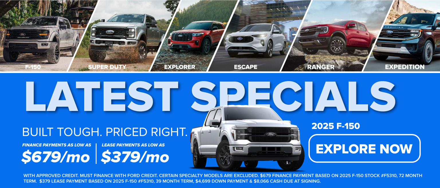 Various truck models lineup from a dealership, including Super Duty, Explorer, Escape, Ranger, and Expedition, with an advertisement for a future truck model.