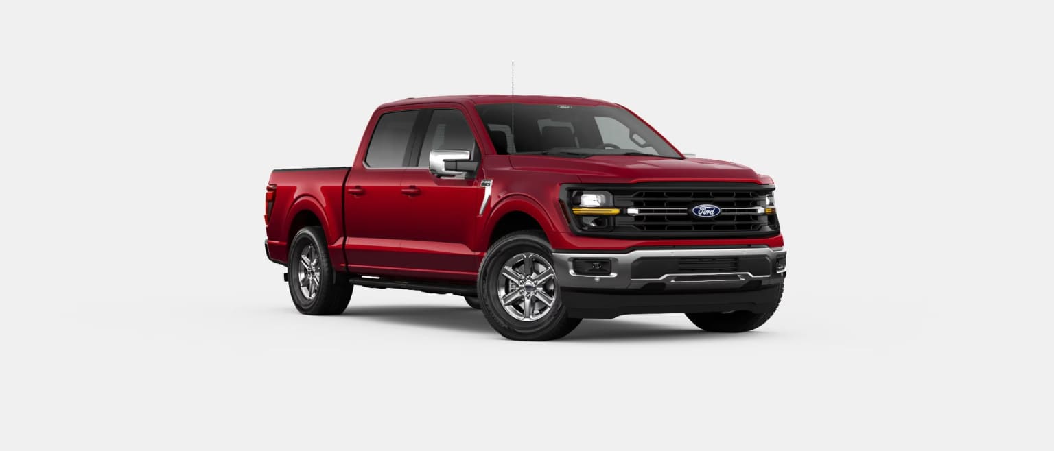 A bright red pickup truck with a rugged, off-road appearance stands prominently in the frame against a plain white background.