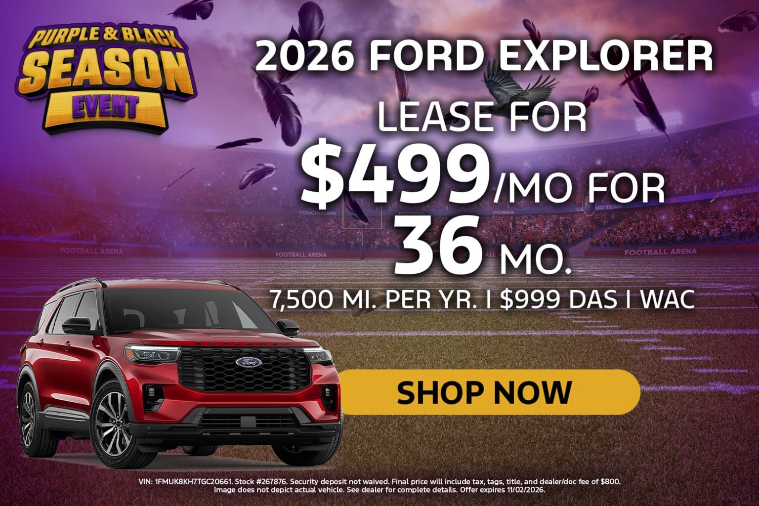 Red SUV on football field with crowded stadium in background