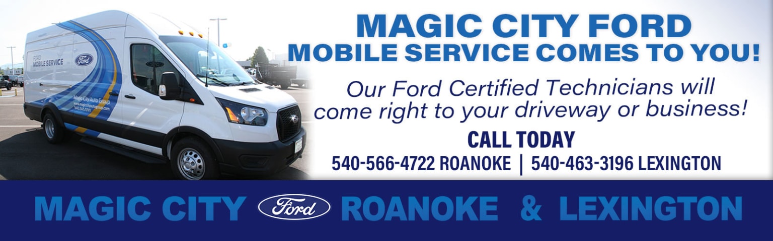 The image shows a van with a logo and contact information for their mobile service in Roanoke, Virginia. The background appears to be a city street with buildings and street lights visible.