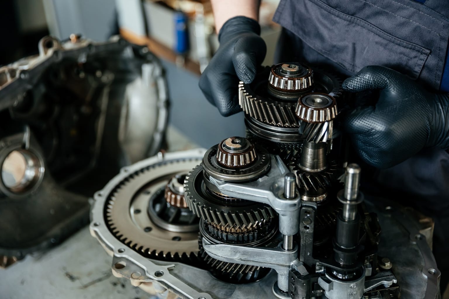 Technician assembling transmission gears during Honda transmission service at Apple Honda in Ellicott City, MD