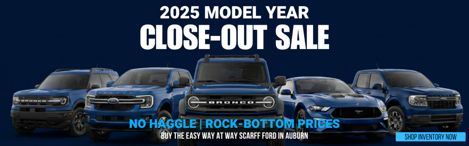 Several blue vehicles are displayed in the foreground against a dark blue background with white text announcing a "2025 MODEL YEAR CLOSE-OUT SALE."