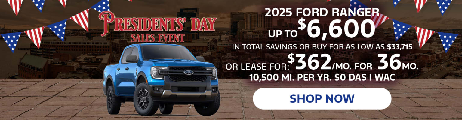 The image features a blue pickup truck prominently displayed in the foreground, with a Presidents' Day sales event advertisement in the background, highlighting the 2025 model and its associated pricing and leasing options.