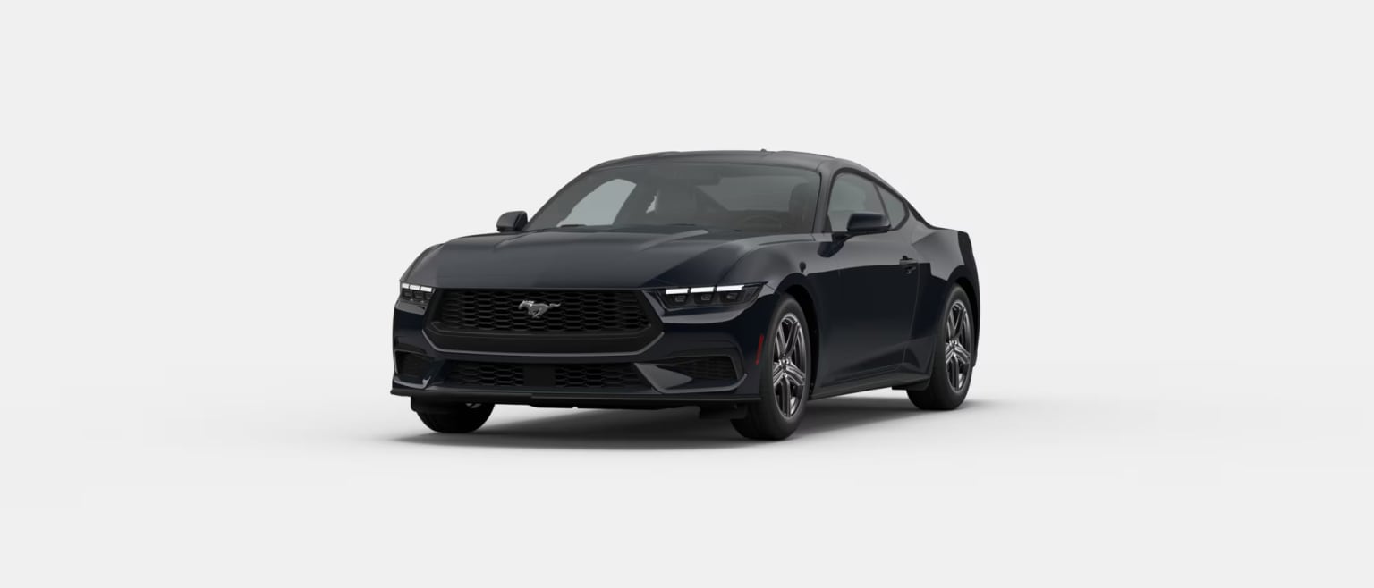 A sleek, black electric SUV with a bold, angular design stands prominently against a plain white background.