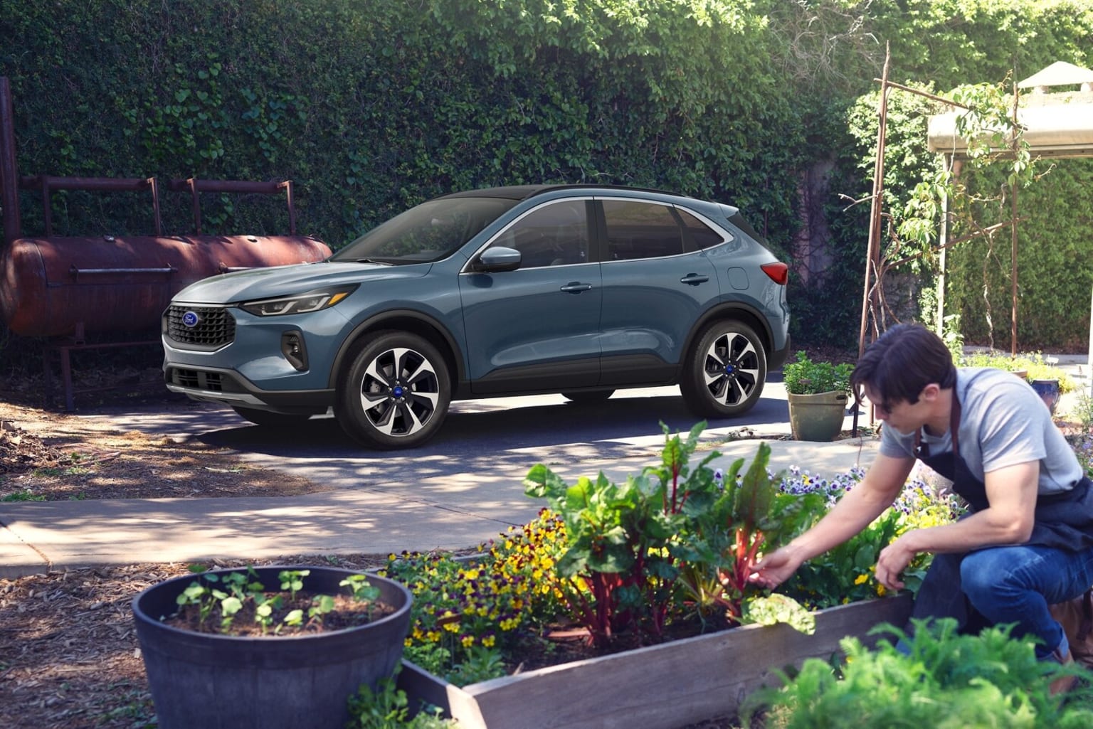 A person is tending to a garden in the foreground, with a silver SUV parked in the background.