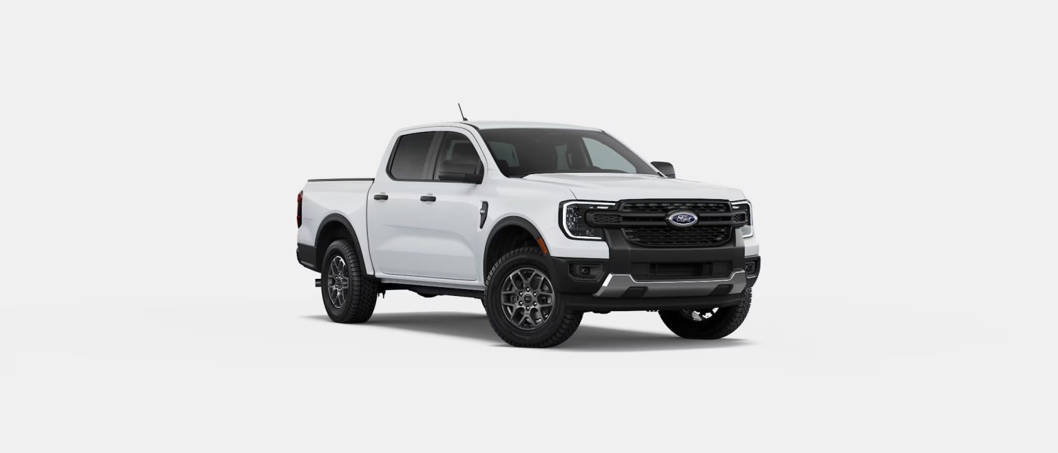 An off-road designed white pickup truck in a prominent position, set against a plain white background.