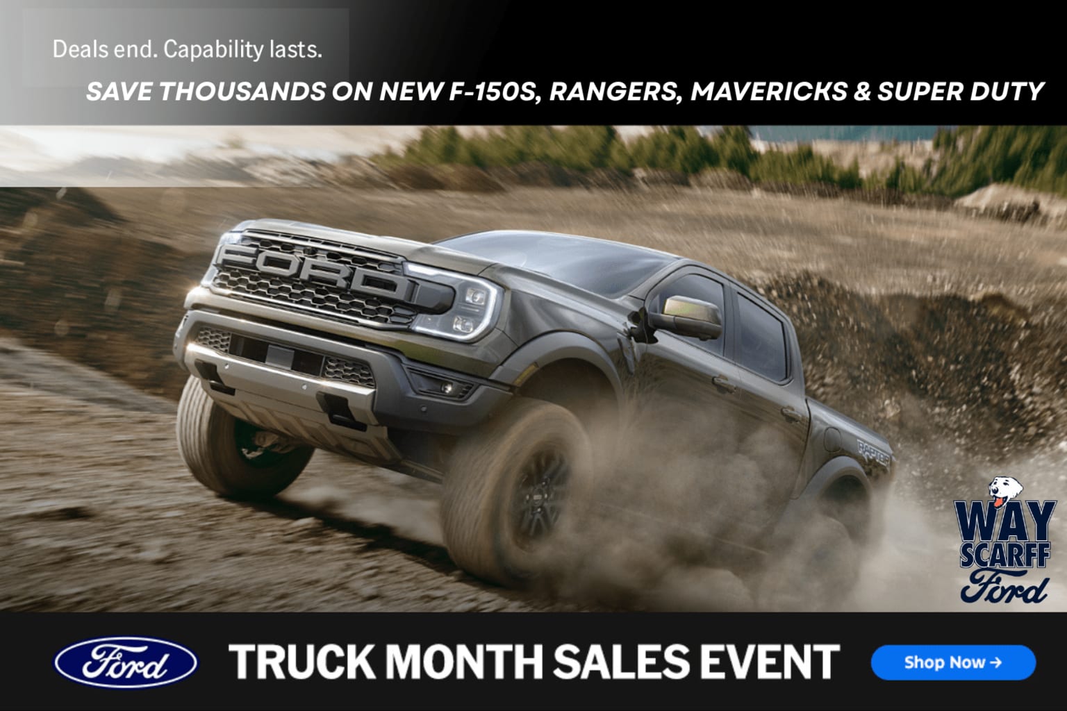 The image shows a pickup truck driving through a dusty, off-road environment.