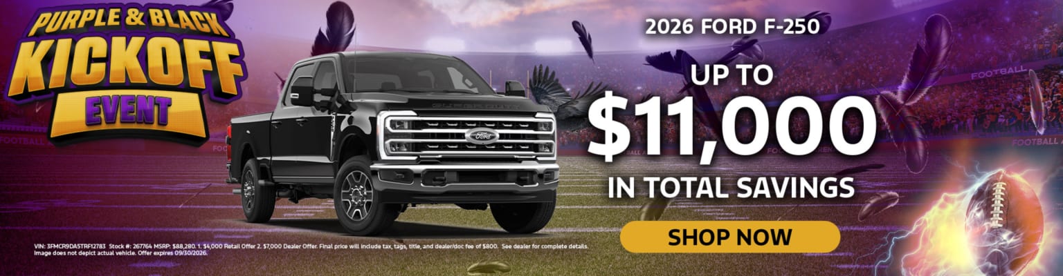 A black truck is featured in the foreground with a "Purple & Black Kickoff Event" banner and savings information, set against a background of abstract purple and black shapes and a football.