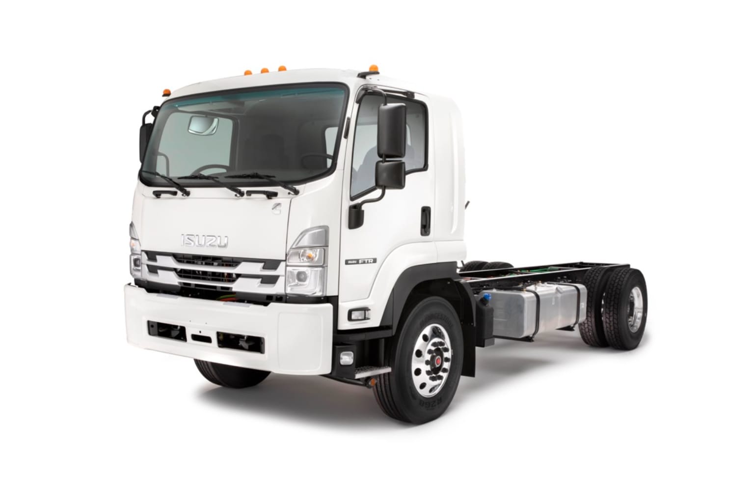 A white truck chassis on a white background, with front grille and headlights visible.