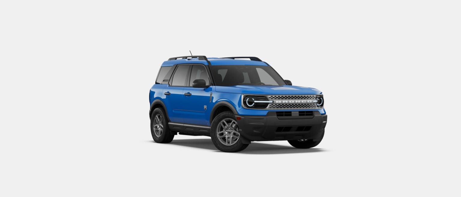 A blue SUV is parked on a white background.