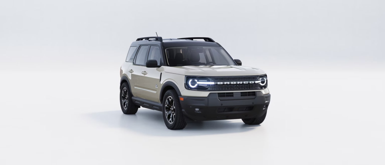 Off-road vehicle with rugged design and large tires in silver and black color, set against a plain white background.