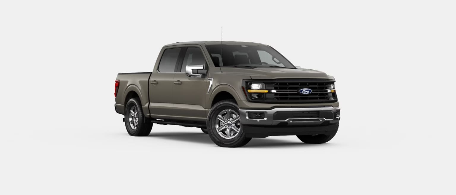 A rugged and powerful-looking pickup truck in a matte gray color, standing prominently against a plain white background.