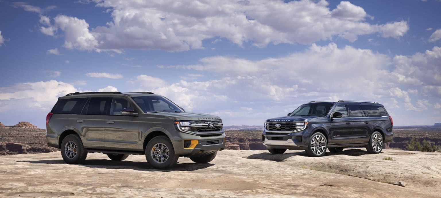 2025 Ford Expedition and Expedition MAX parked next to each other in arid setting