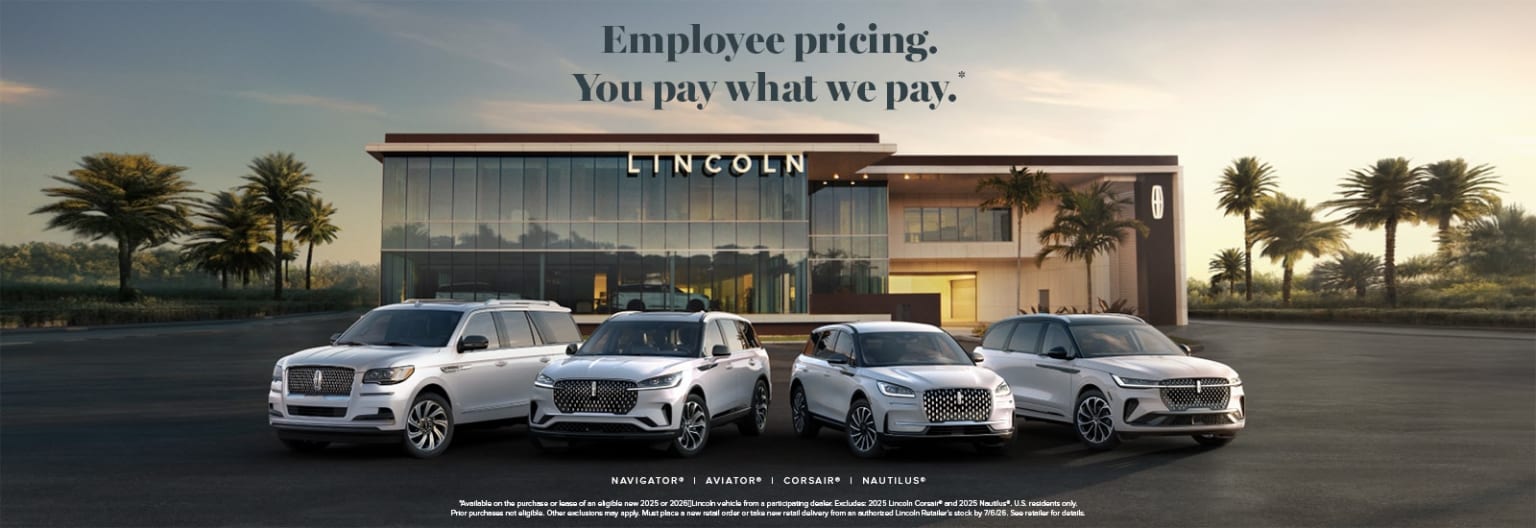The image displays a lineup of various luxury vehicles in front of a modern, glass-fronted building with the logo prominently displayed, set against a backdrop of palm trees and a cloudy sky.