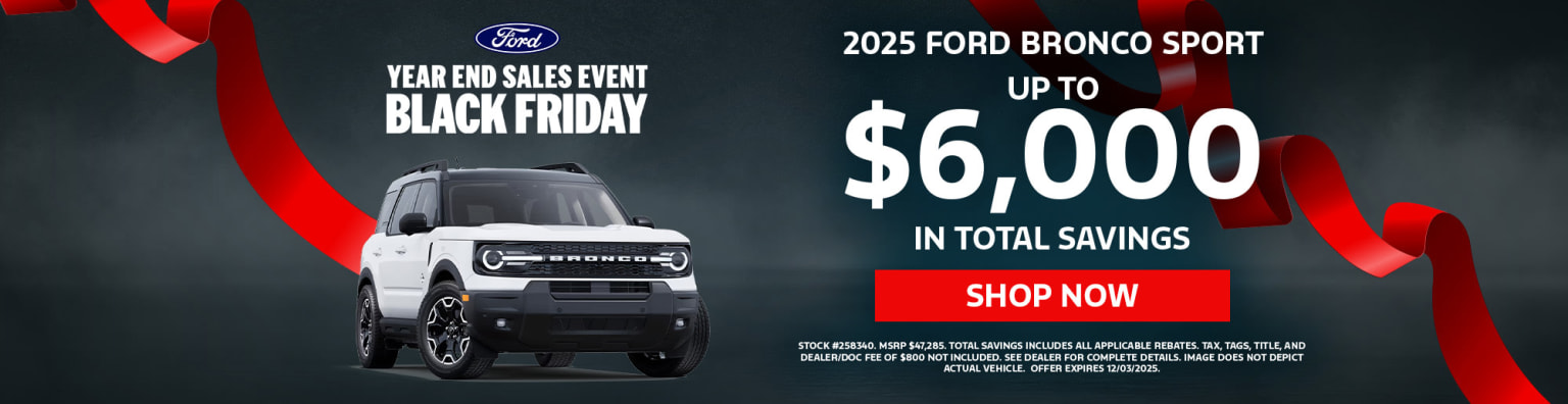The image features an SUV prominently displayed in the foreground, with a "Black Friday" sales event promotion and up to $6,000 in total savings highlighted in the background.