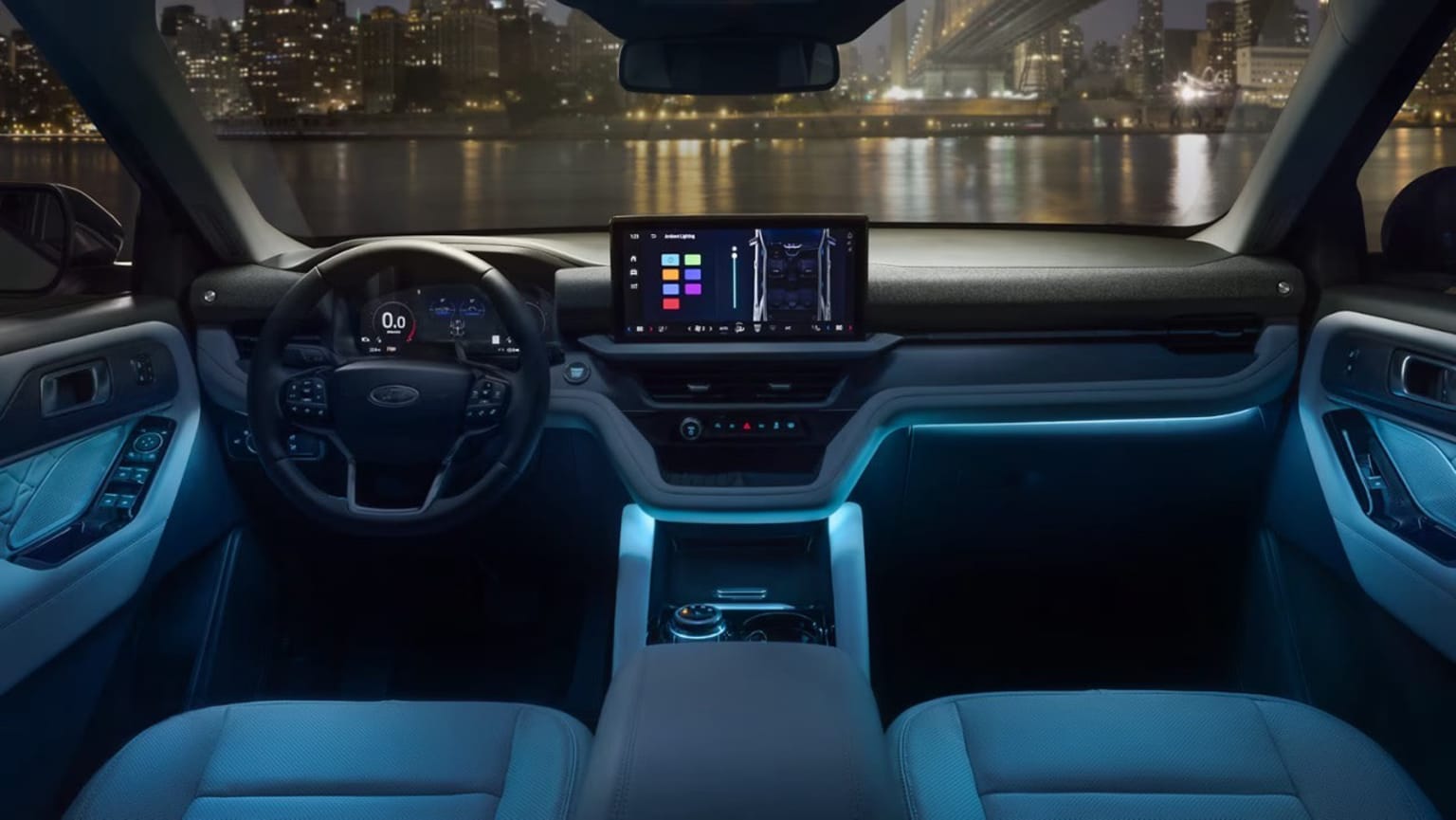 The image shows the interior of a modern, high-tech vehicle with a sleek dashboard, a large central display, and ambient lighting that creates a futuristic atmosphere. In the background, the city skyline is visible through the windshield, suggesting an urban setting.