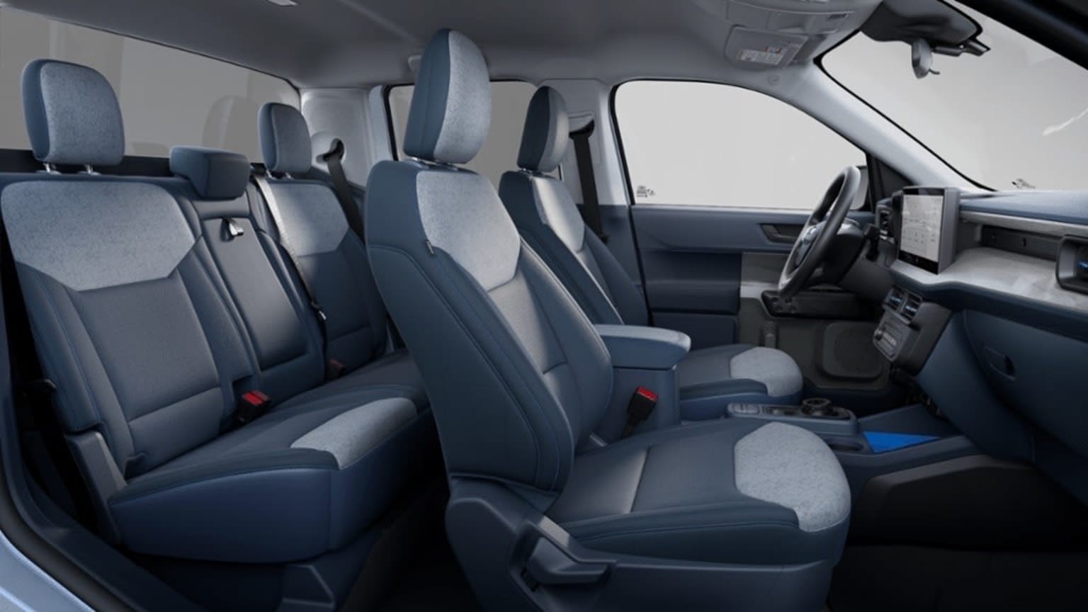 The image shows the interior of a vehicle with multiple gray seats and a dashboard visible in the background.