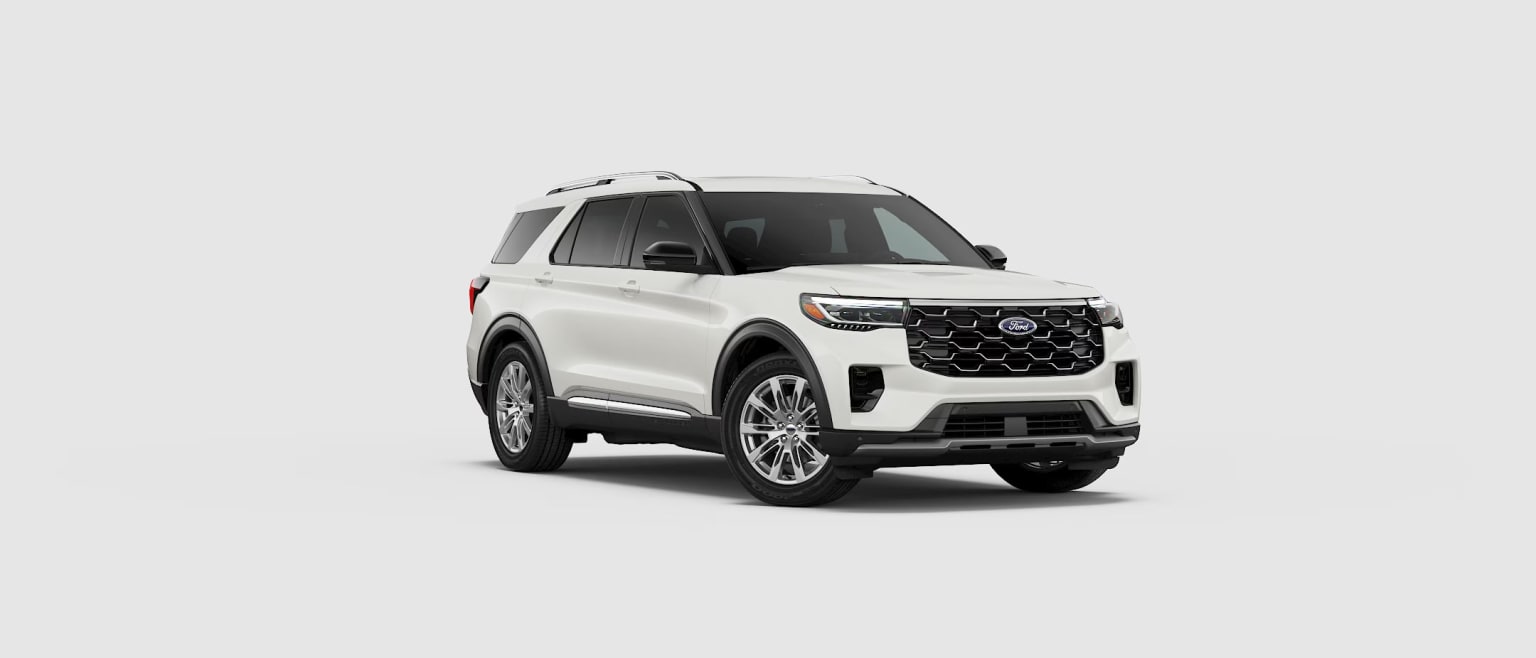 "SUV with distinctive grille design and rugged exterior features on plain background."