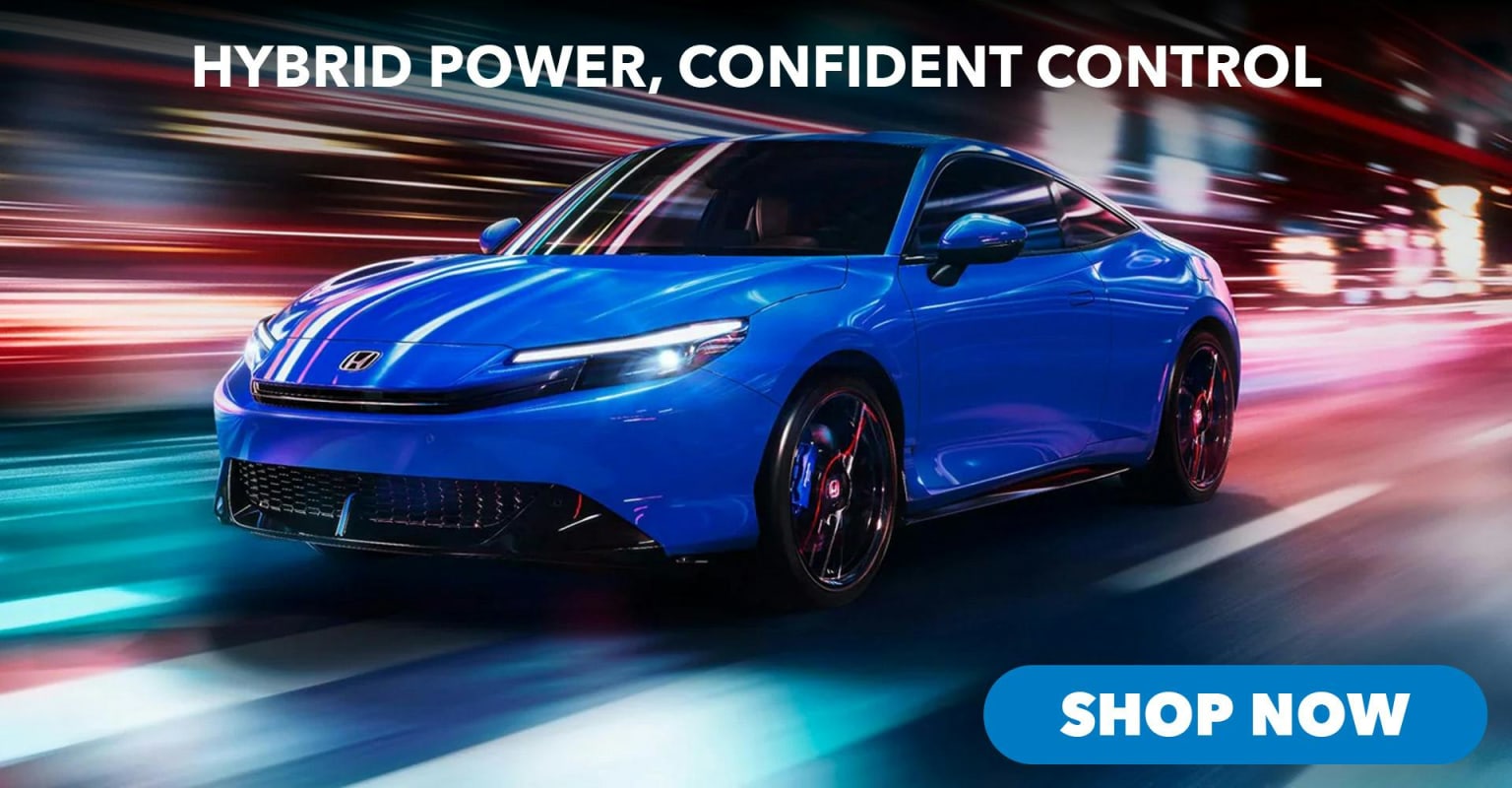 A sleek blue hybrid car with "HYBRID POWER, CONFIDENT CONTROL" text above it is driving on a blurred, colorful road at night, with a "SHOP NOW" button below.