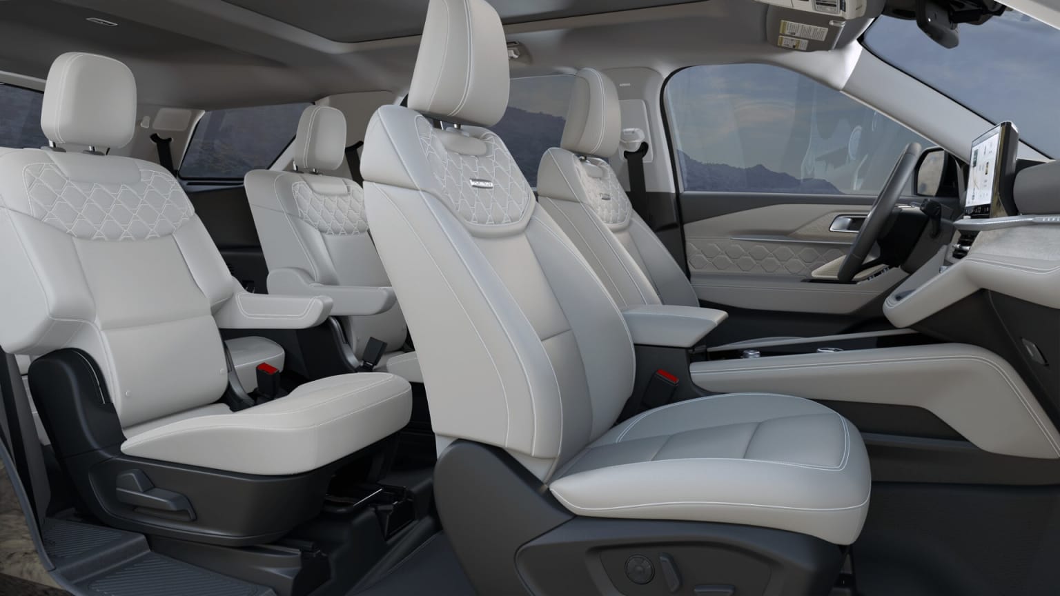 Image showing interior of a vehicle with multiple rows of white leather seats and a spacious, well-lit cabin.