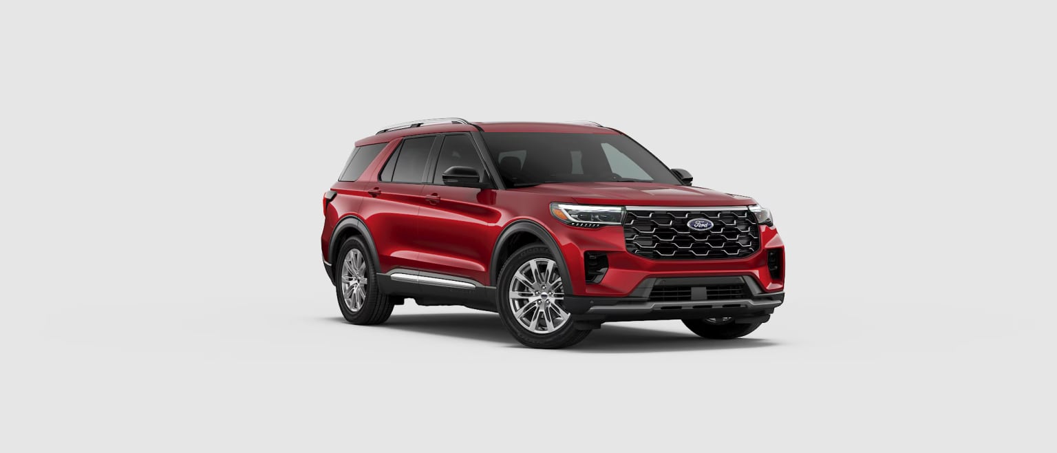 A red SUV with a bold front grille and sleek design, set against a plain white background.