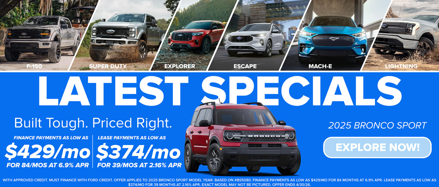 Various vehicle models showcased in the image include a heavy-duty truck, midsize SUV, compact SUV, electric SUV, and off-road SUV, along with a promotional advertisement for current specials on these vehicles.