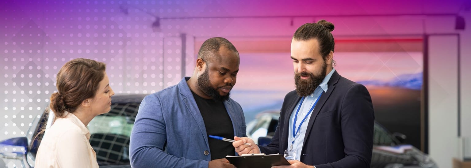 Three individuals having a discussion in a vibrant and colorful office setting.