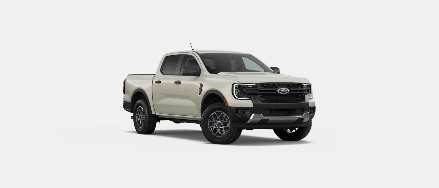 Off-road-ready pickup truck with bold, aggressive design and large all-terrain tires, set against a plain white background.