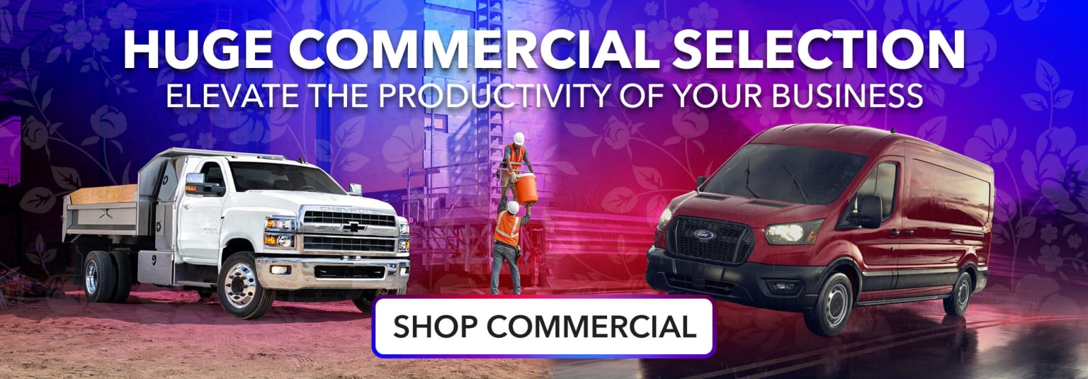 Image of two types of commercial trucks with text "Huge Commercial Selection" and "Elevate the Productivity of Your Business" displayed.