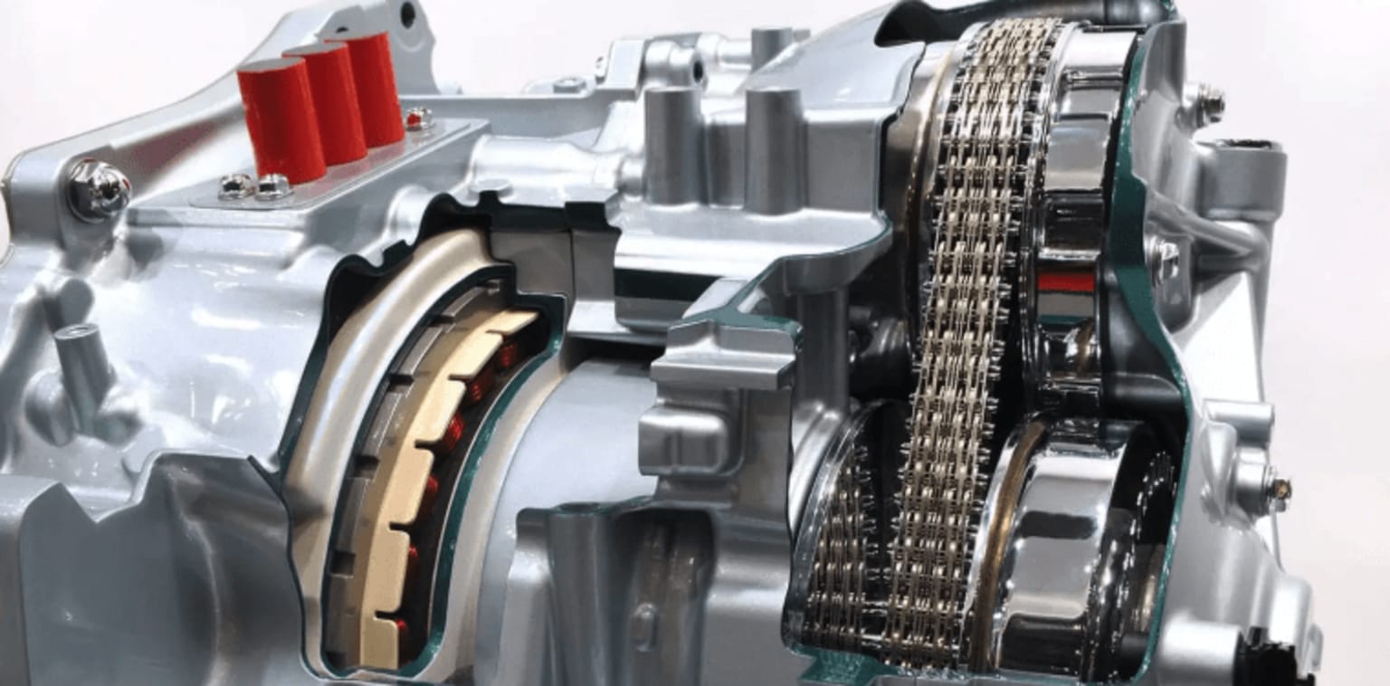 A close-up view of the internal components of a mechanical device, showcasing various gears, chains, and other intricate parts.