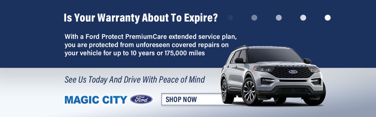 The image features a white Ford SUV prominently displayed in the foreground, with a blue background highlighting information about an extended service plan offered by Ford Protect PremiumCare.