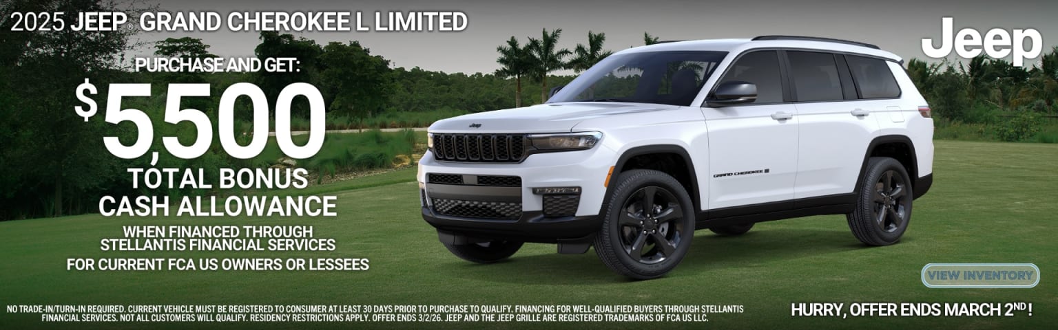 The image shows a white SUV parked in a grassy area with trees in the background.