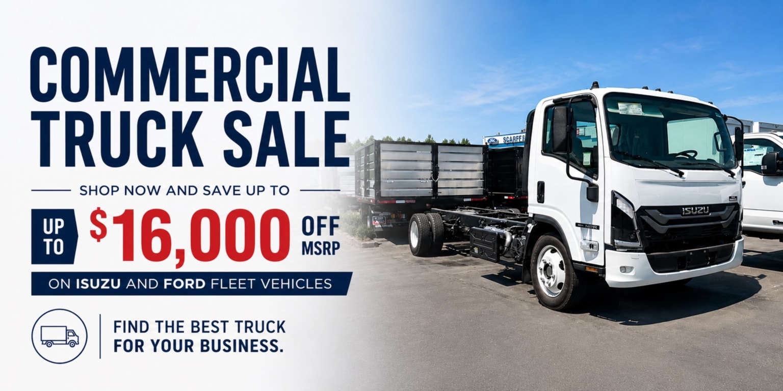 A white commercial truck parked in a lot.