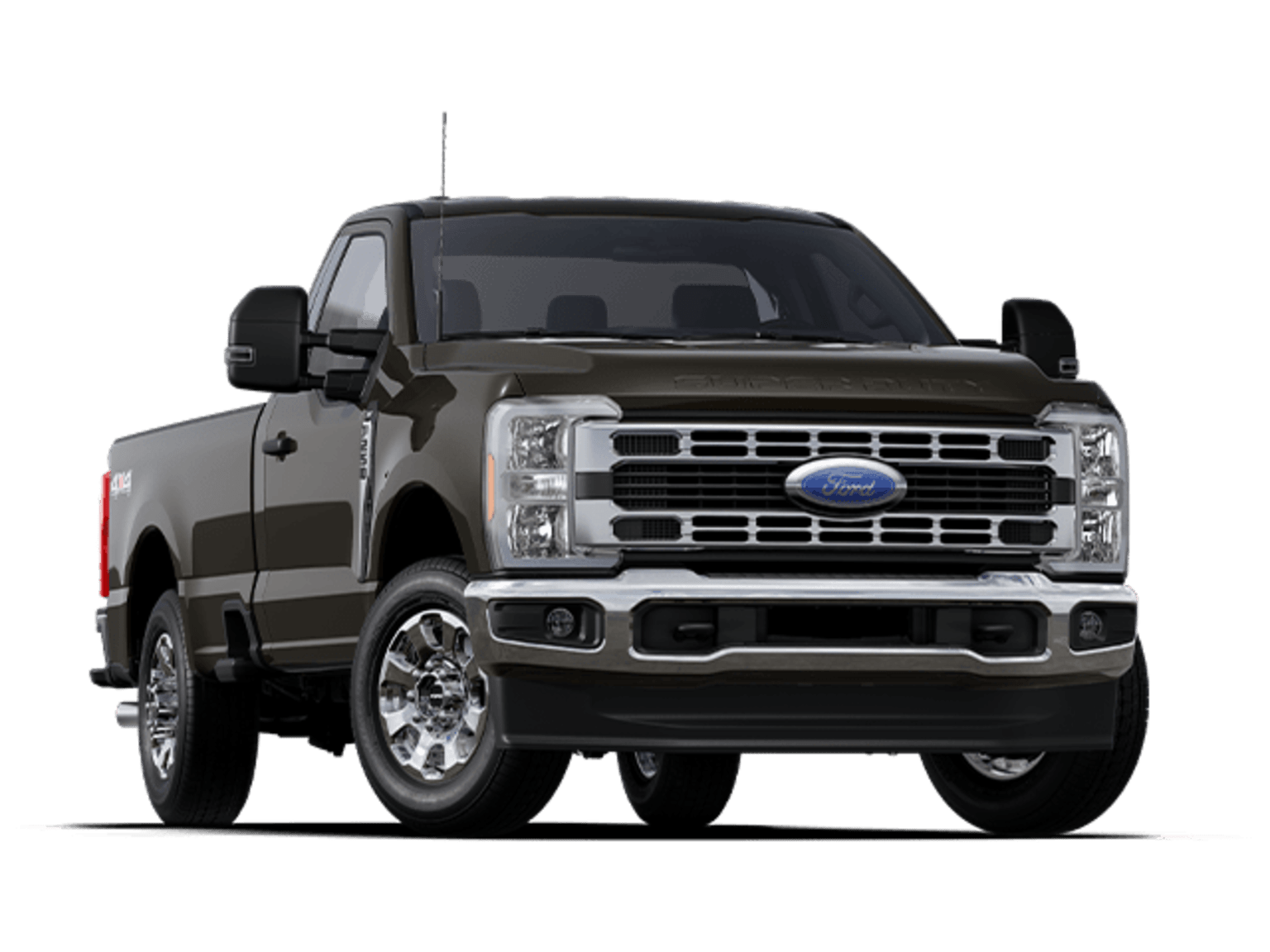 A large, dark-colored pickup truck with a prominent grille and headlights, standing on a plain background.