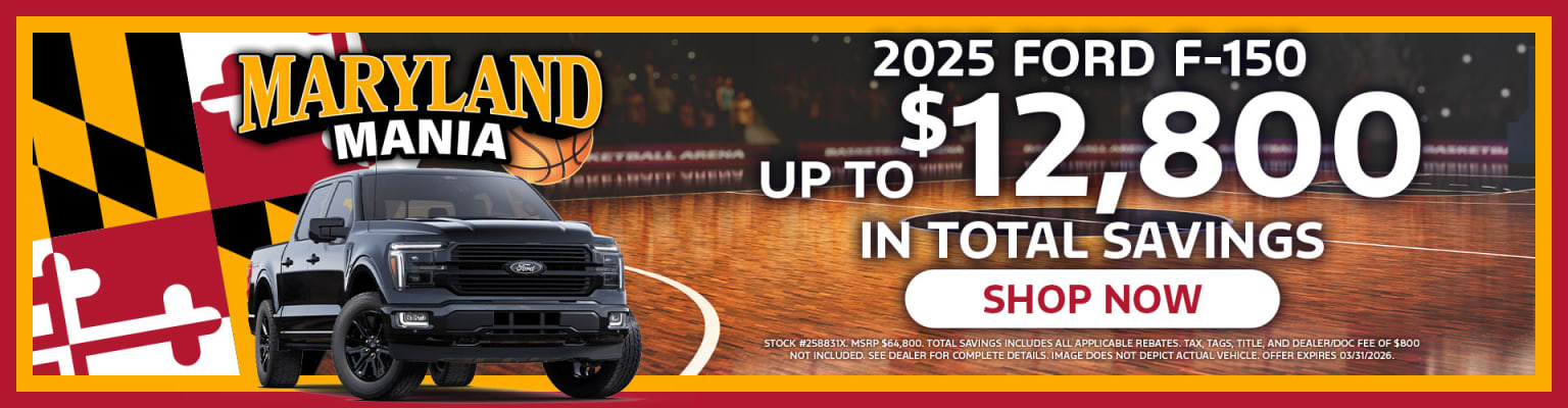 A large black pickup truck prominently displayed in the foreground, set against a basketball court backdrop with the "Maryland Arena" logo visible.