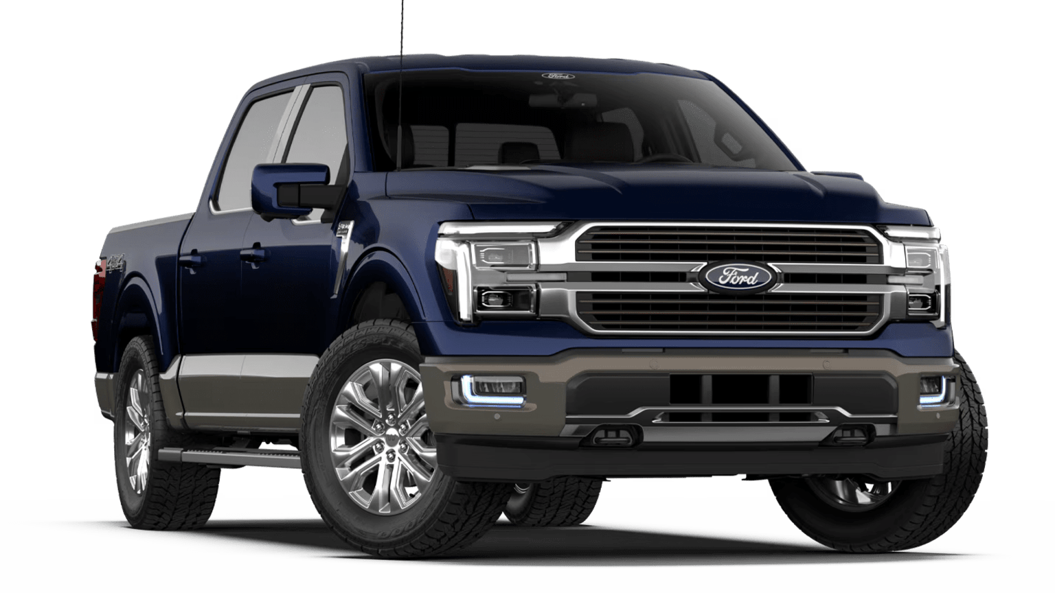 A dark blue large pickup truck with a prominent grille and chrome accents.