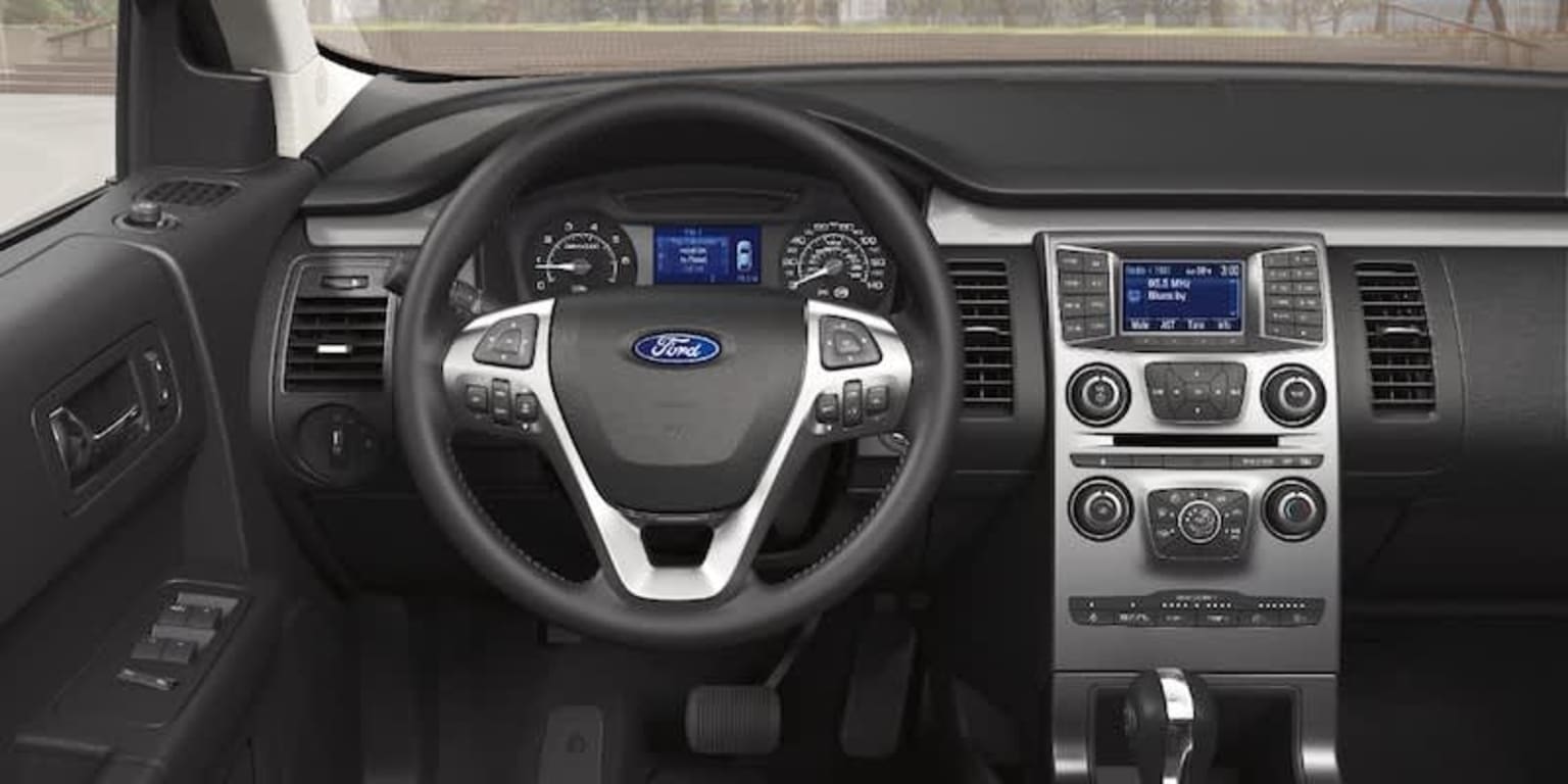 the interior of a car with a steering wheel, dashboard, and dash lights and dashboard lights are shown