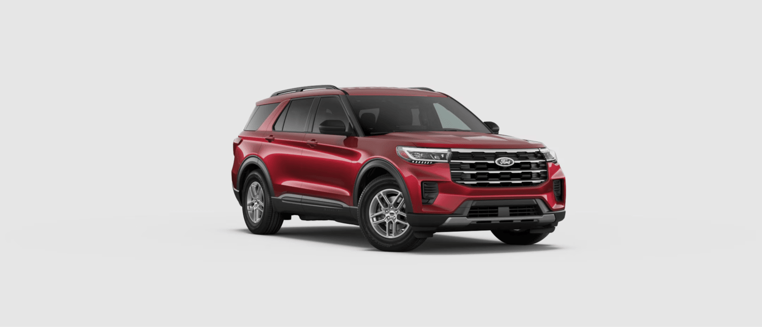 Red SUV in front of light gray background.