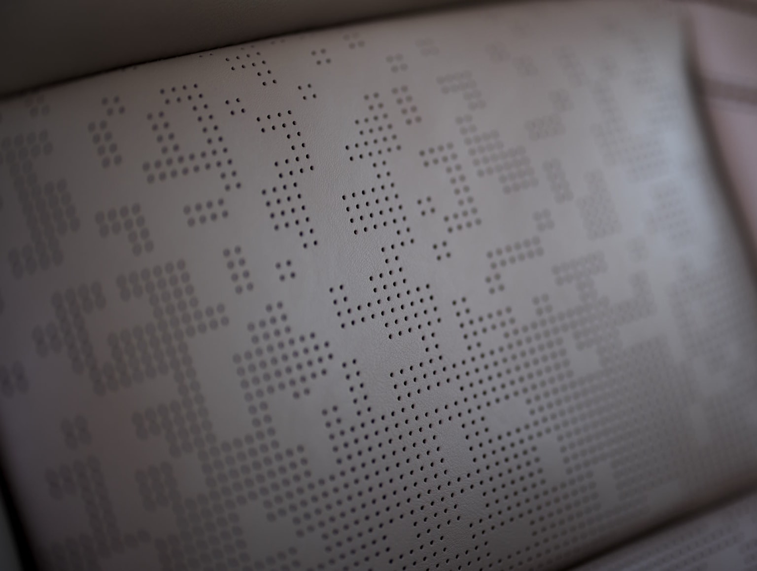 Abstract pattern grid on the surface.