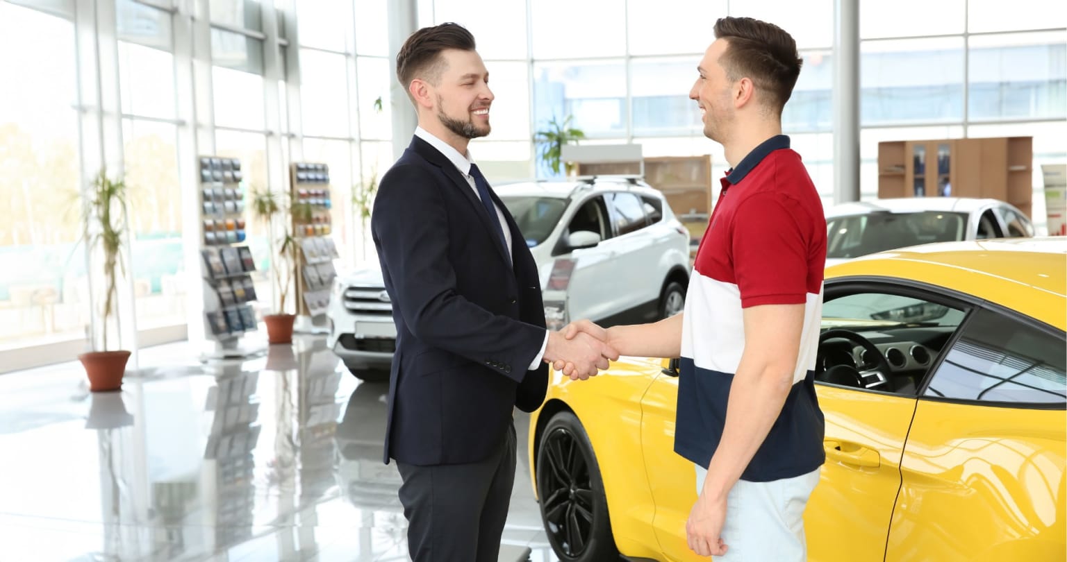 Dealership employee showing a fast, local trade-in value at J.C. Lewis Lincoln in Savannah, GA. Start online, then visit us for a firm offer serving Bluffton, Beaufort, Hilton Head, and Hardeeville.