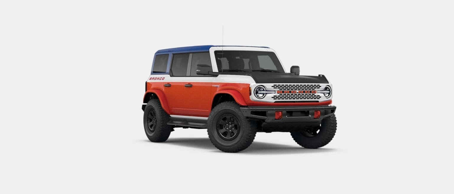 A red, white, and blue SUV is presented against a plain white background.
