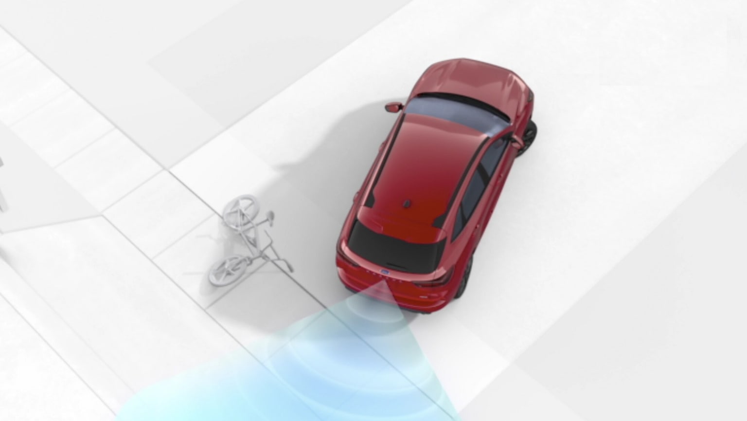 A red sports car in motion with a dynamic blurred background.